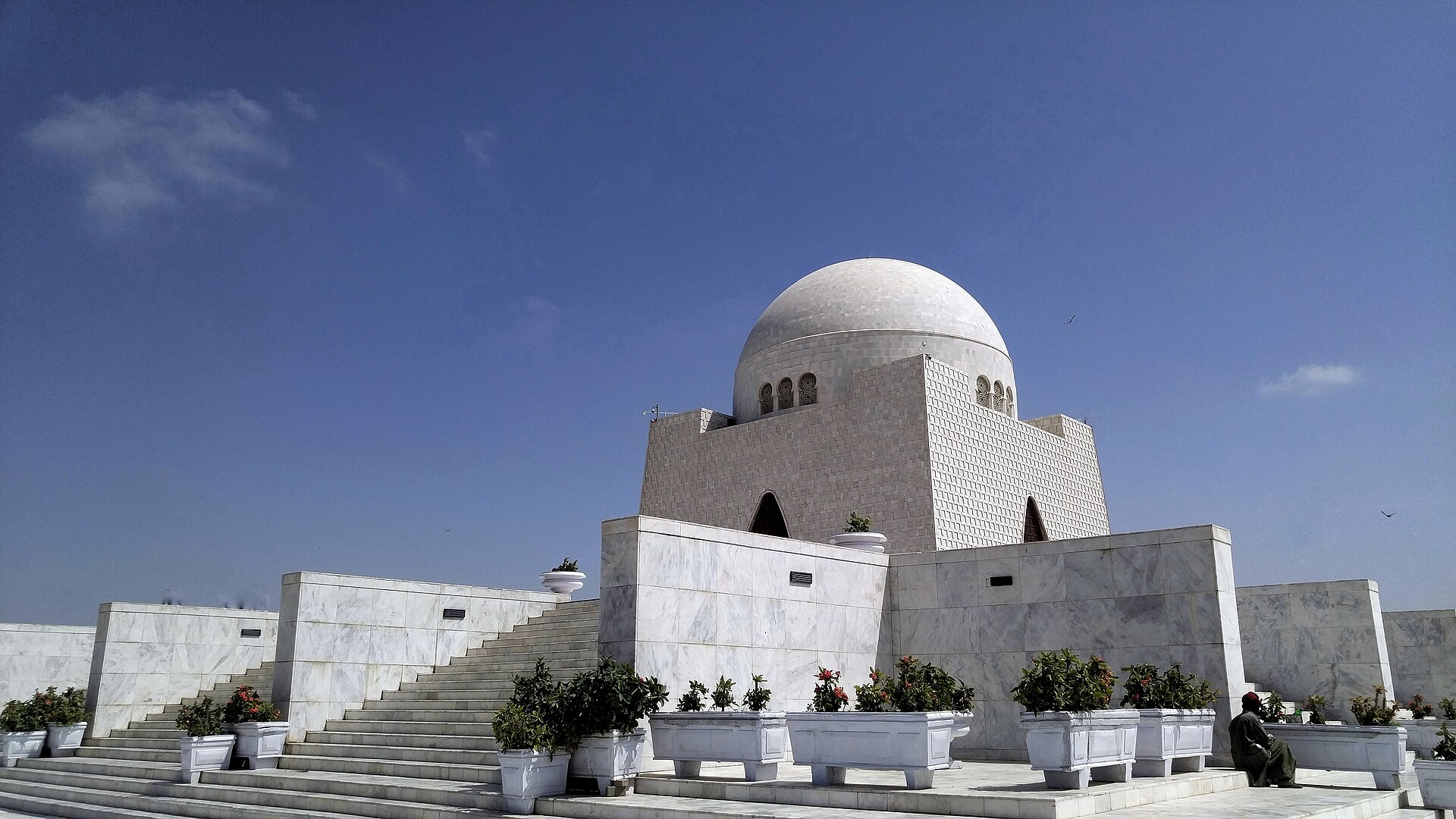 Muhammad Ali Jinnah Mausoleum (Mazar-e-Quaid) seen against the green cityscape of Karachi, Pakistan